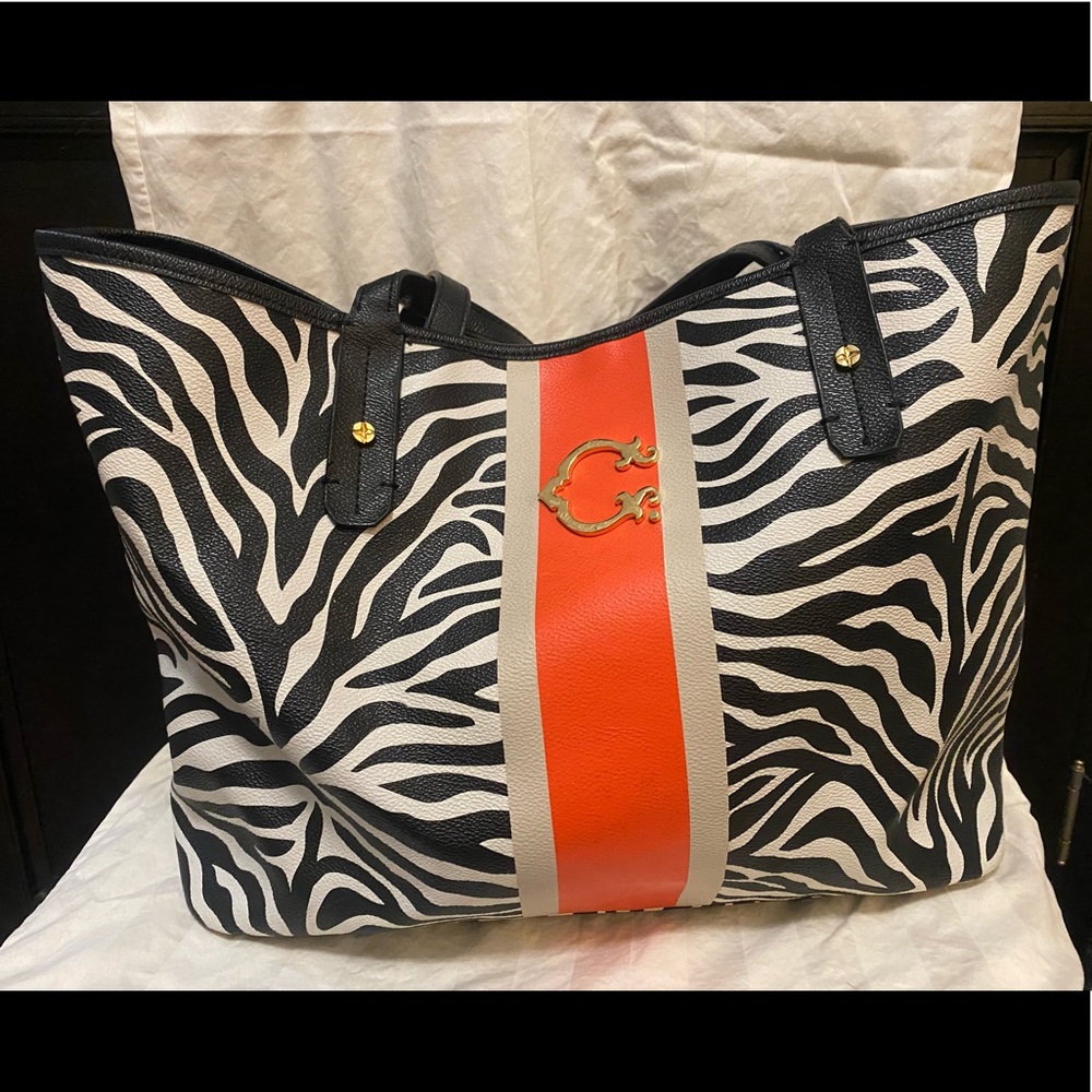 C. Wonder Zebra Print Overnight Bag